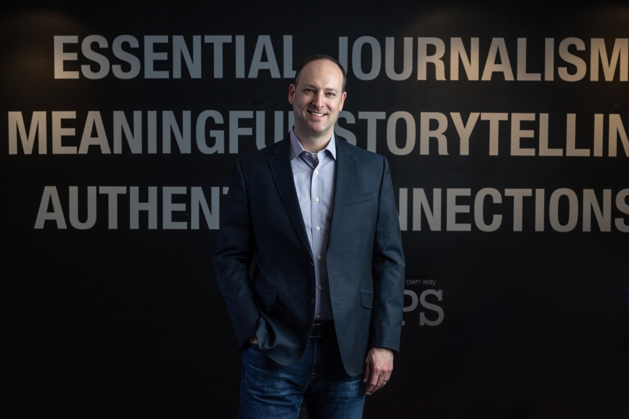 Adam Symson 2019 headshot.jpg