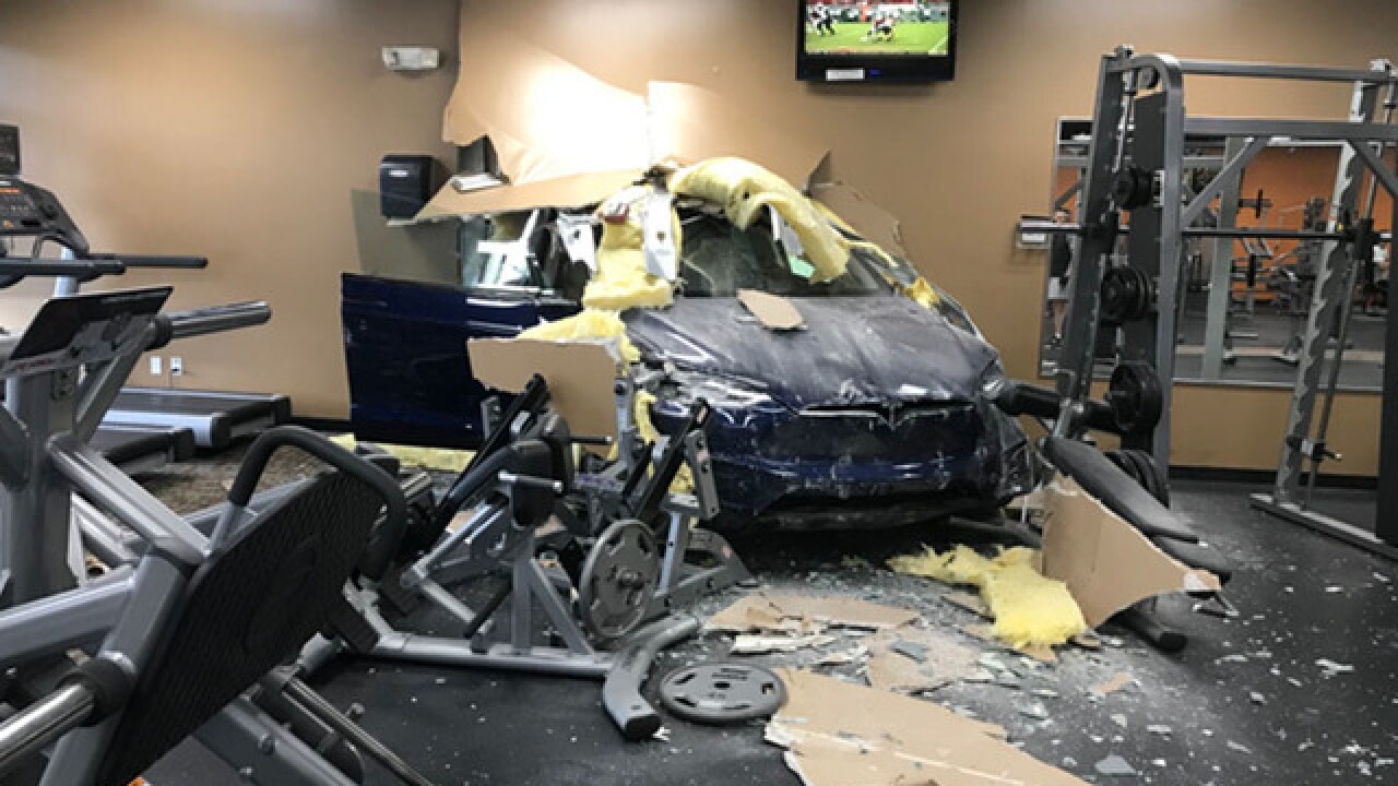 Tesla slams through wall of Florida gym