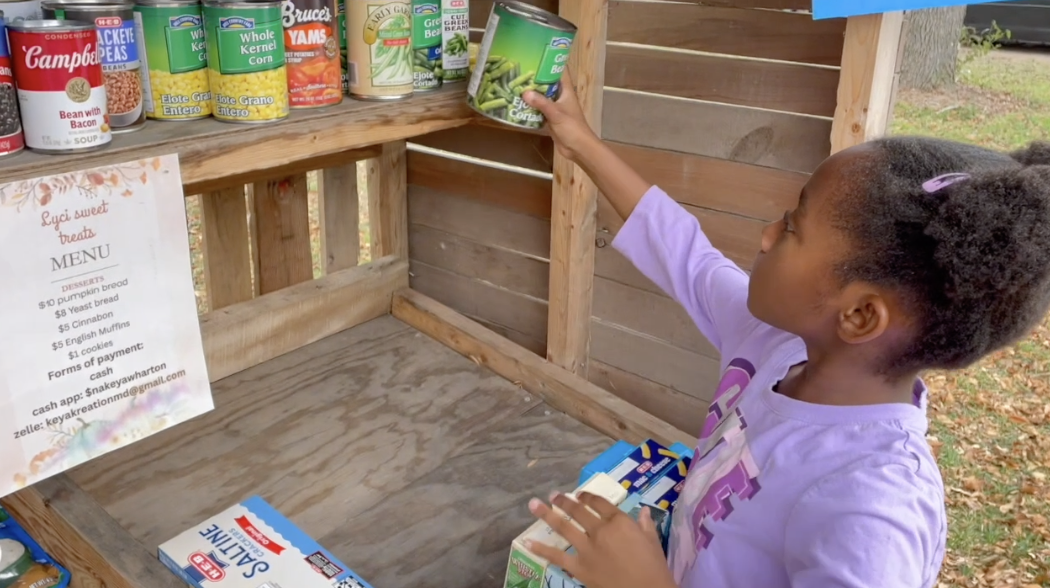 9-year-old Marlin girl uses farm stand to help neighbors with free food items