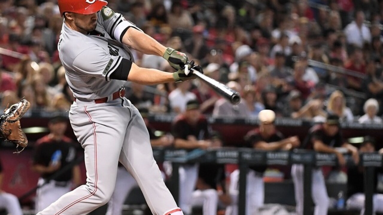 Duvall's slam helps Reds beat Diamondbacks 7-4
