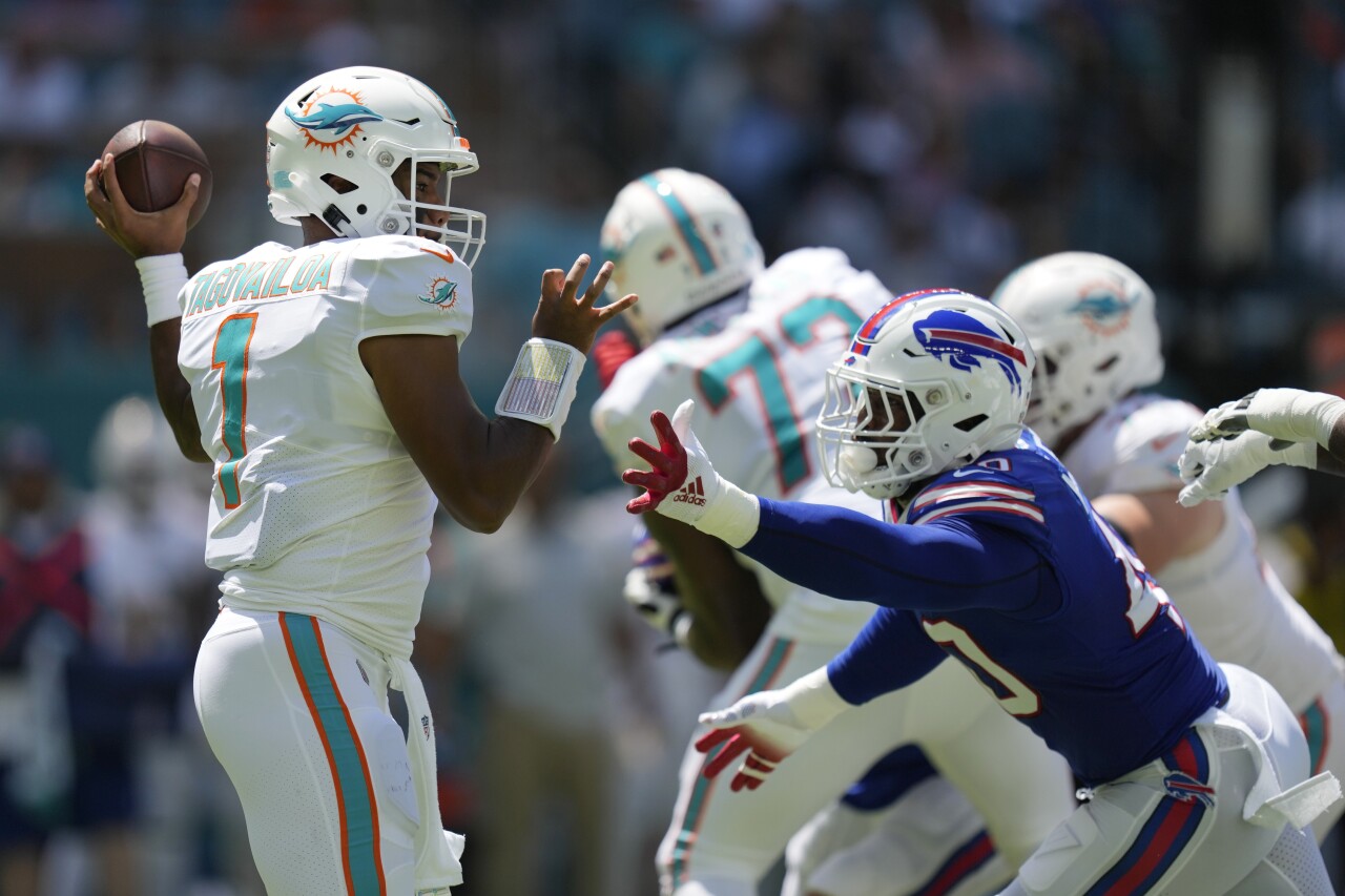 Miami Dolphins QB Tua Tagovailoa pressured by Buffalo Bills linebacker Von Miller, Sept. 25, 2022