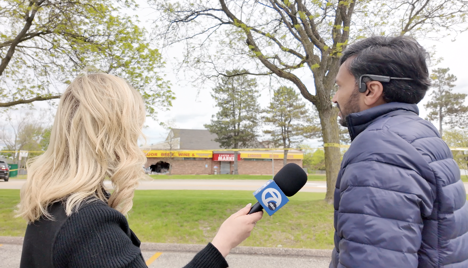 Owner of Canton City Market Ronak Patel surveying damage