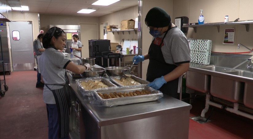 Staff preparing meals at Hardin High School