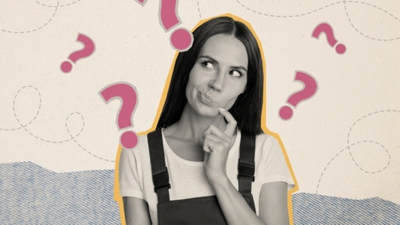 Stock image of a woman thinking.