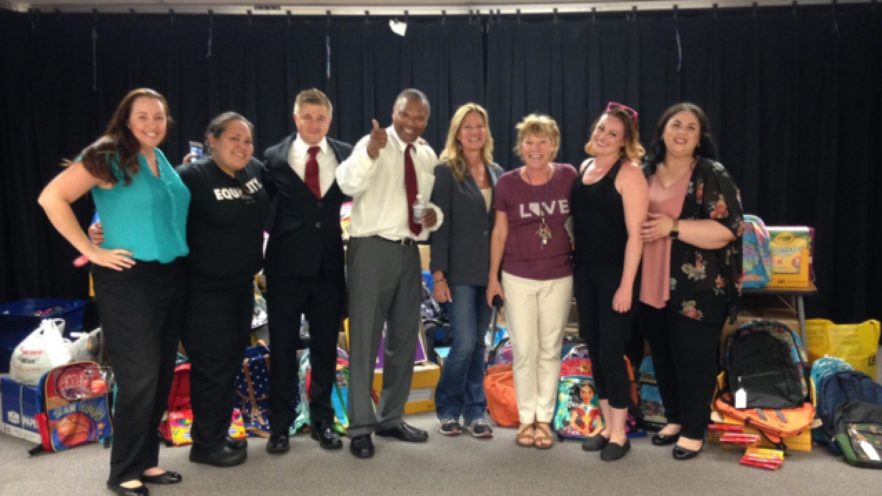 Red Rock employees donate school supplies