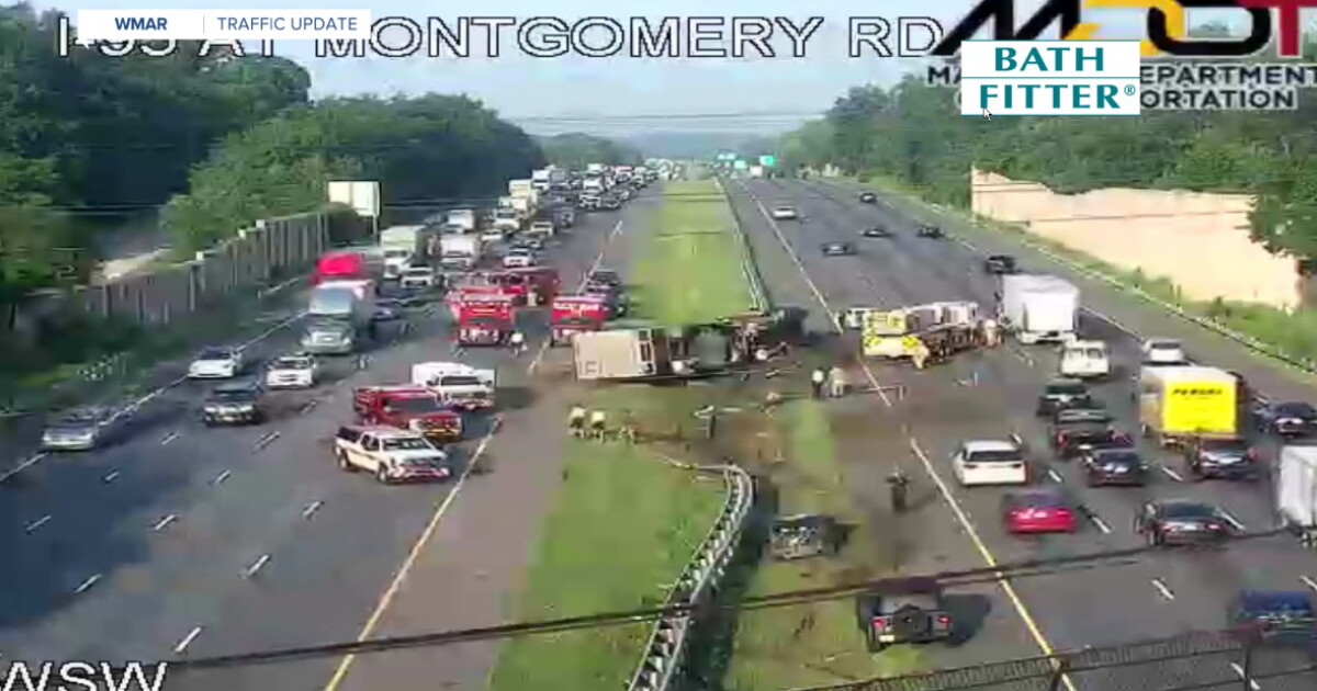 Tractor-trailer overturns on Interstate 95 median