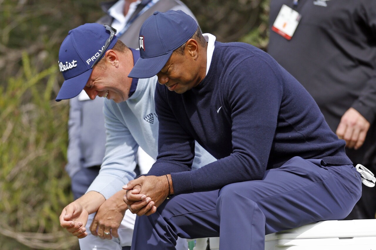 Tiger Woods and Justin Thomas share laugh at Genesis Invitational, Feb. 17, 2023