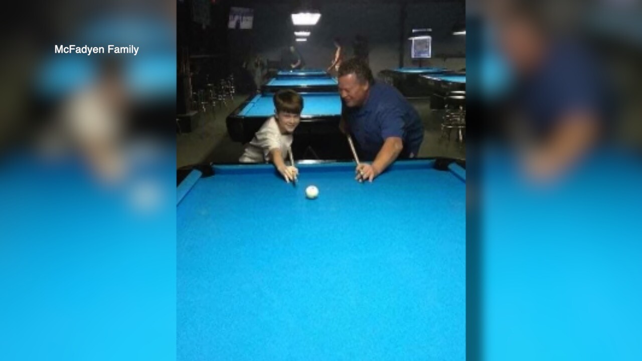 Konnor with his dad.jpg