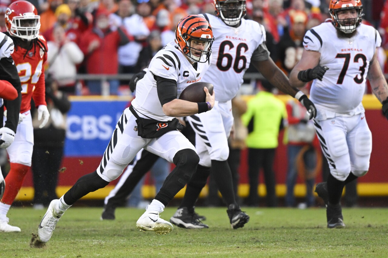 Cincinnati Bengals QB Joe Burrow carries football at Kansas City Chiefs in AFC Championship, Jan. 30, 2022