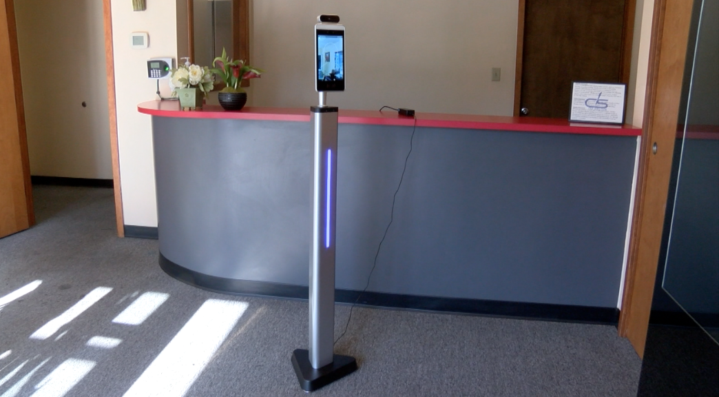 Smartpass device takes tempurature