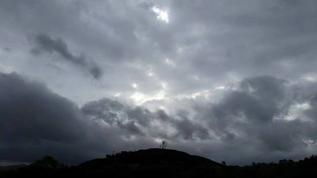 Showers and cloudy conditions