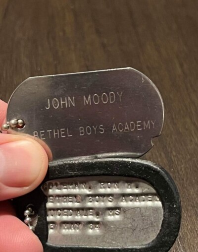 PHOTO- JOHN MOODY DOG TAGS BOYS SCHOOL 