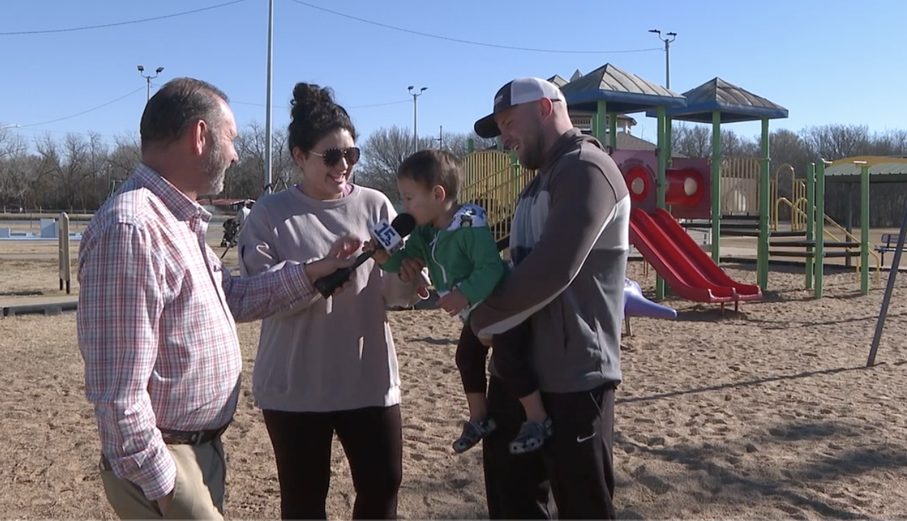 Local residents Payton and Trent Meckel with their son