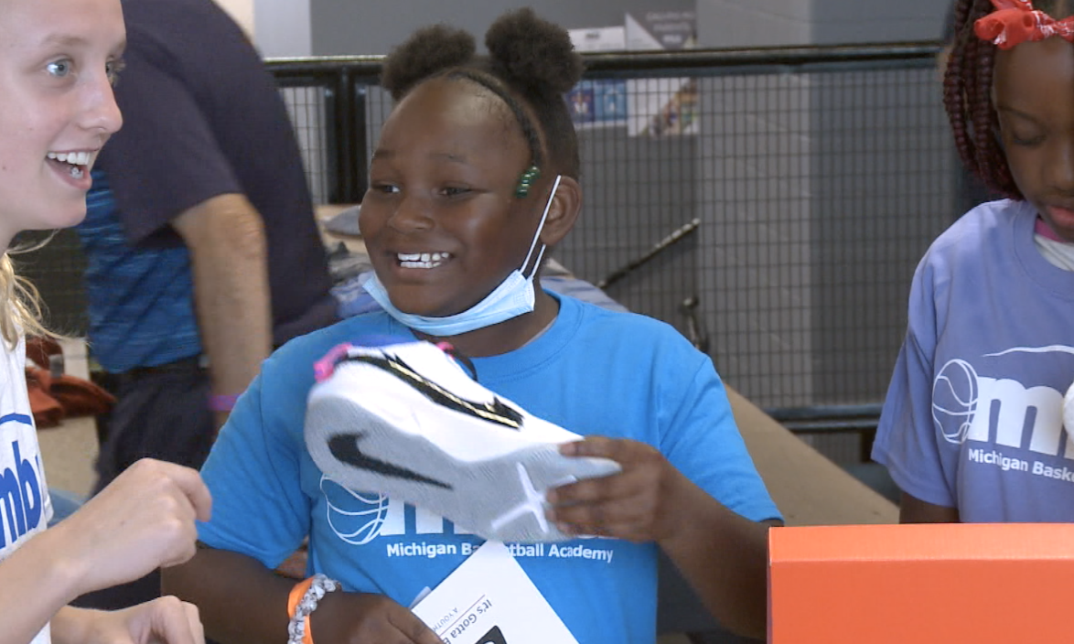 All smiles after receiving new shoes