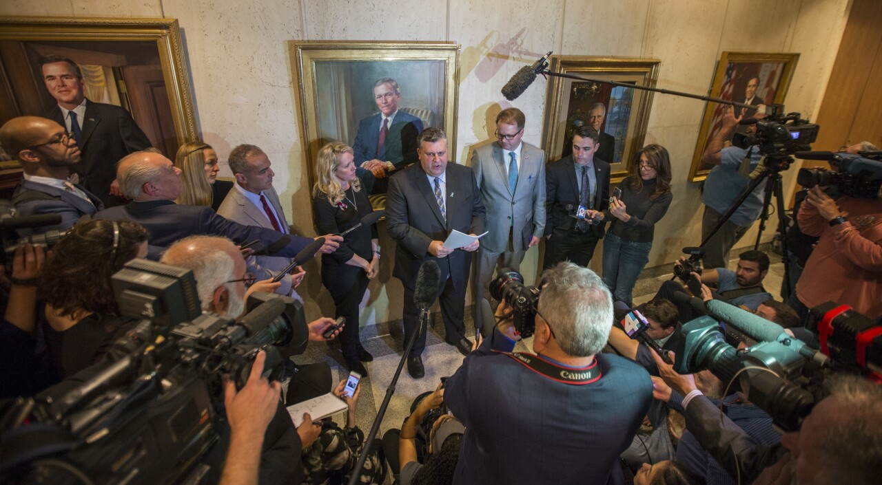 Gena Hoyer, Ryan Petty, Andrew Pollack and Hunter Pollack speak to media at Florida Capitol after Marjory Stoneman Douglas Public Safety Act signed into law in 2018