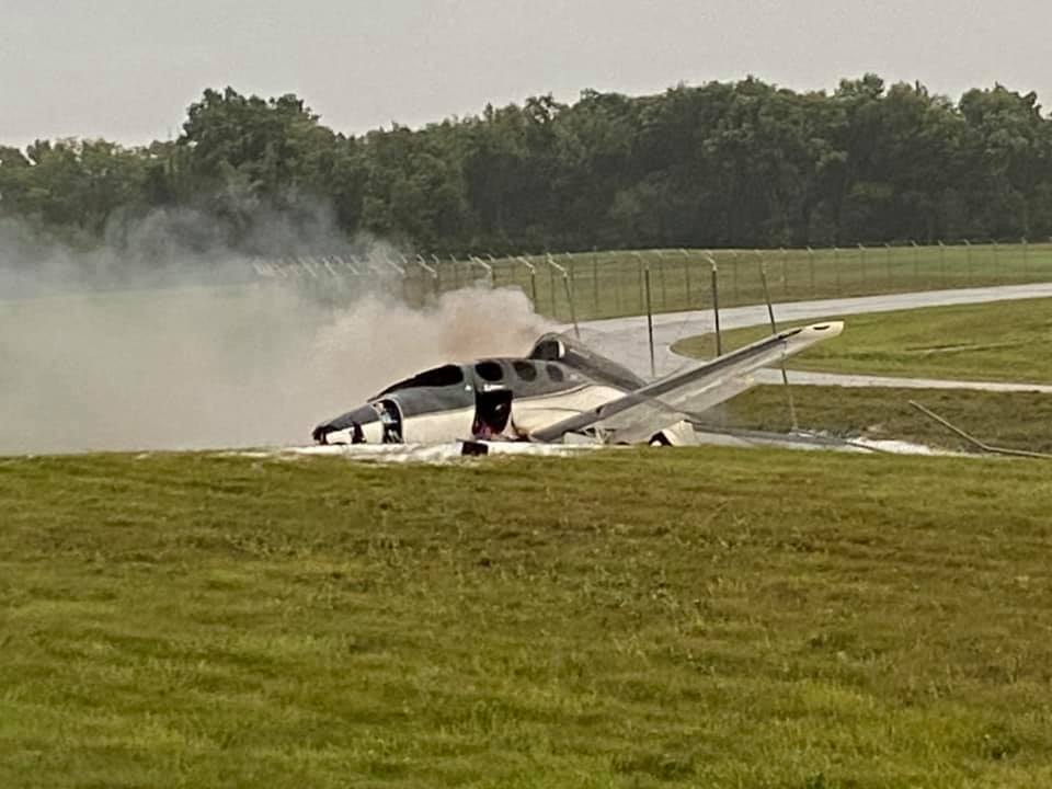 A small plane on fire at Capitol Region International Airport