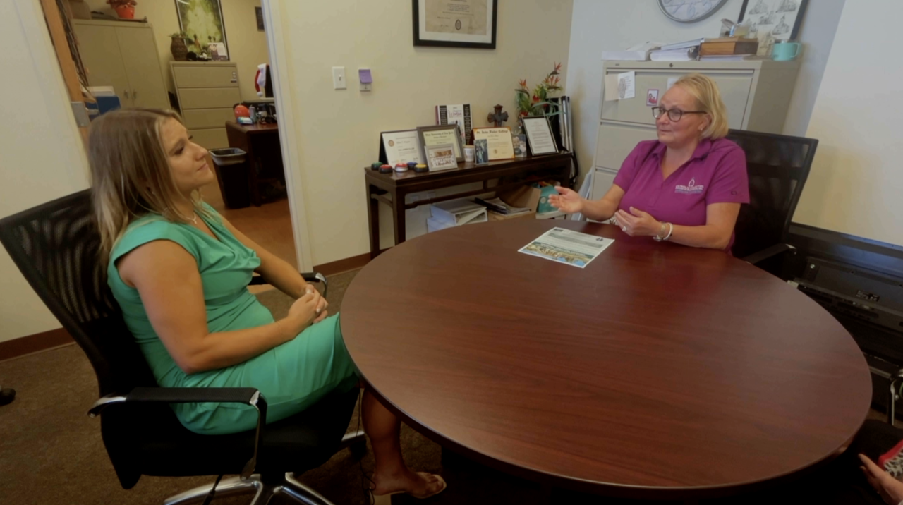 Kate Hussey Ellen Wayne with Catholic Charities.png