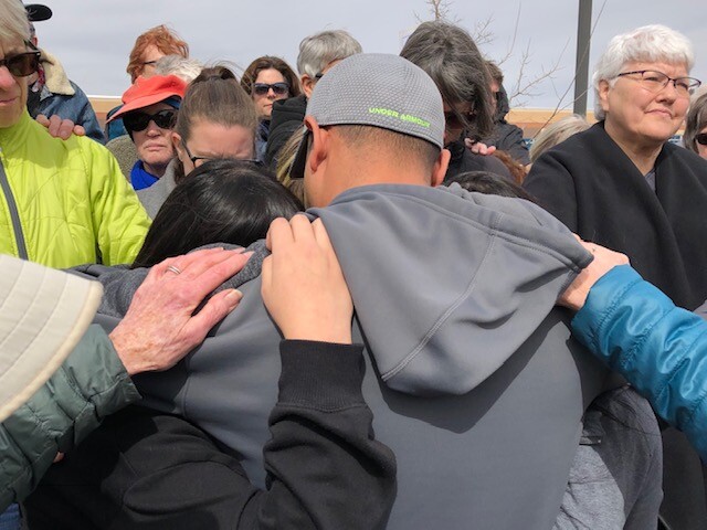 Family hugs after Arturo returned from ICE meeting