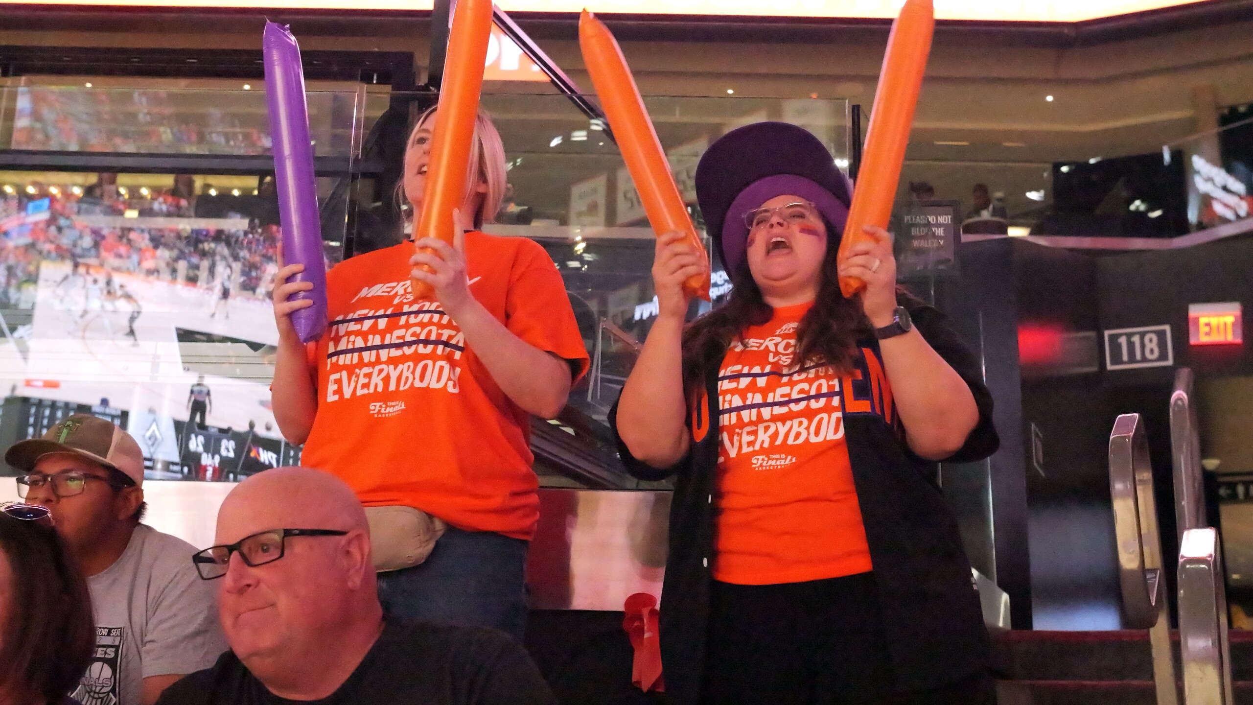 Thunder sticks in action to cheer on the Mercury. 