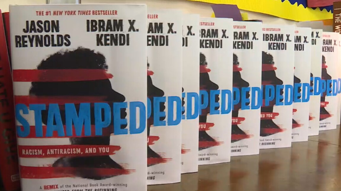 Copies of _Stamped_ Racism, Antiracism, and You_ in a classroom at Riviera Beach Preparatory and Achievement Academy on June 22, 2021.jpg