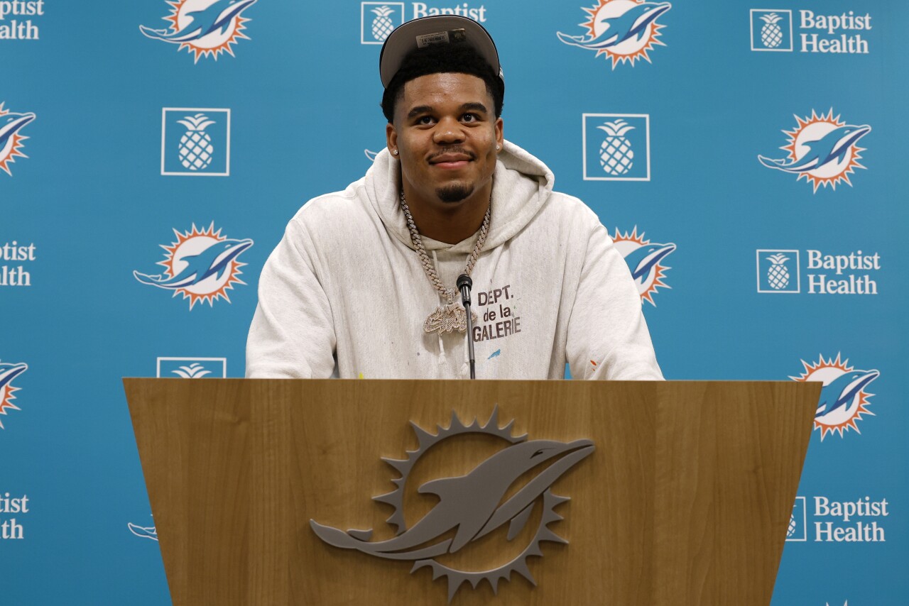 Miami Dolphins defensive end Chop Robinson smiles as he stands in front of team podium during introductory news conference, April 26, 2024