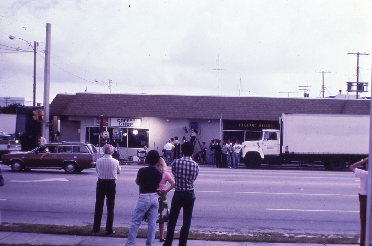 Onlookers during filming of scene from 'Body Heat' at Stella's Coffee Shop