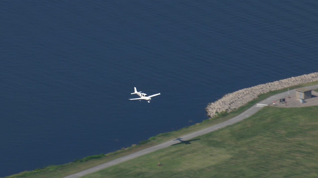 A plane prepares to touch down at Burke Lakefront Airport.
