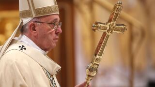Pope Francis arrives at St. Peter's Basilica for the Epiphany Mass on January 6, 2016 in Vatican City, Vatican.