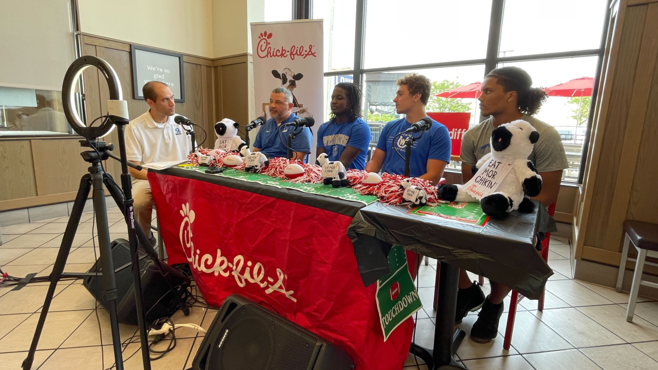 Wyoming coach Aaron Hancock is joined by Wyoming senior quarterback/linebacker Quaid Hauer, senior defensive end/offensive lineman Deuce Wiley and senior slot receiver/linebacker DJ Gray.