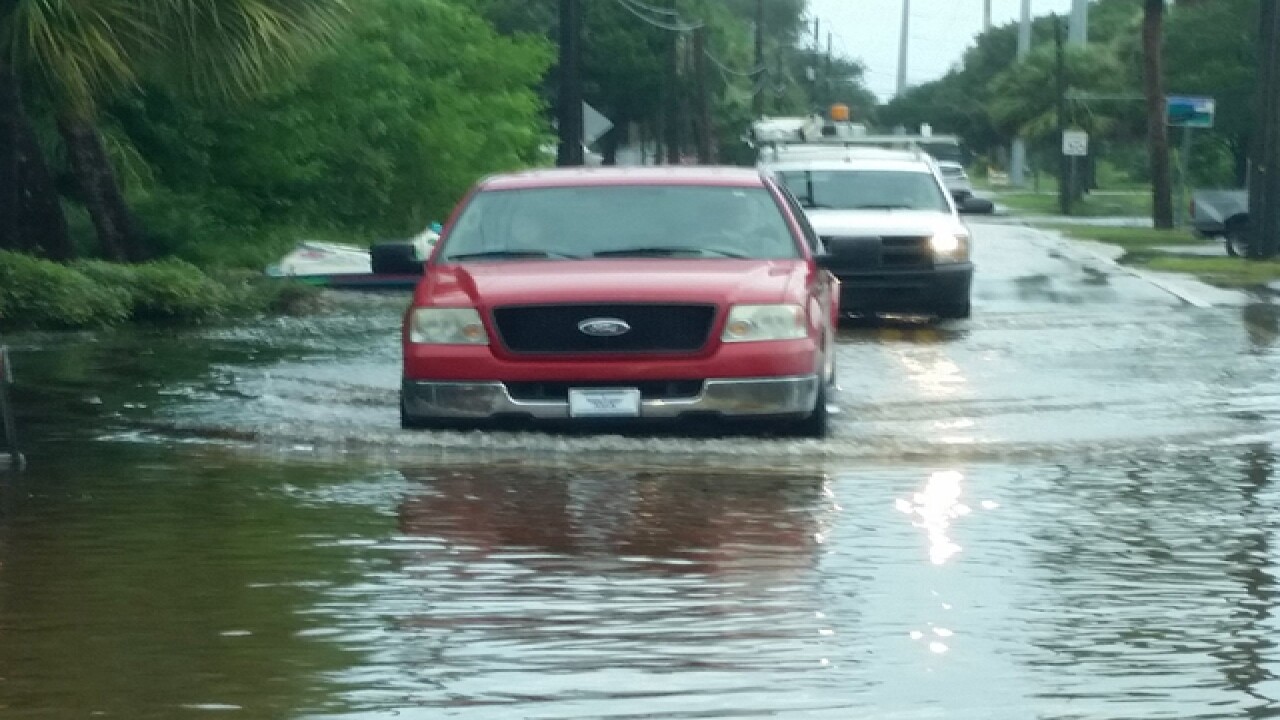 PHOTOS | Tropical system causing flooding