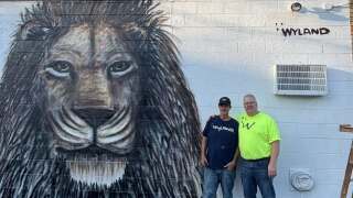 Wyland (left) with his cousin, Kevin Sell (right)
