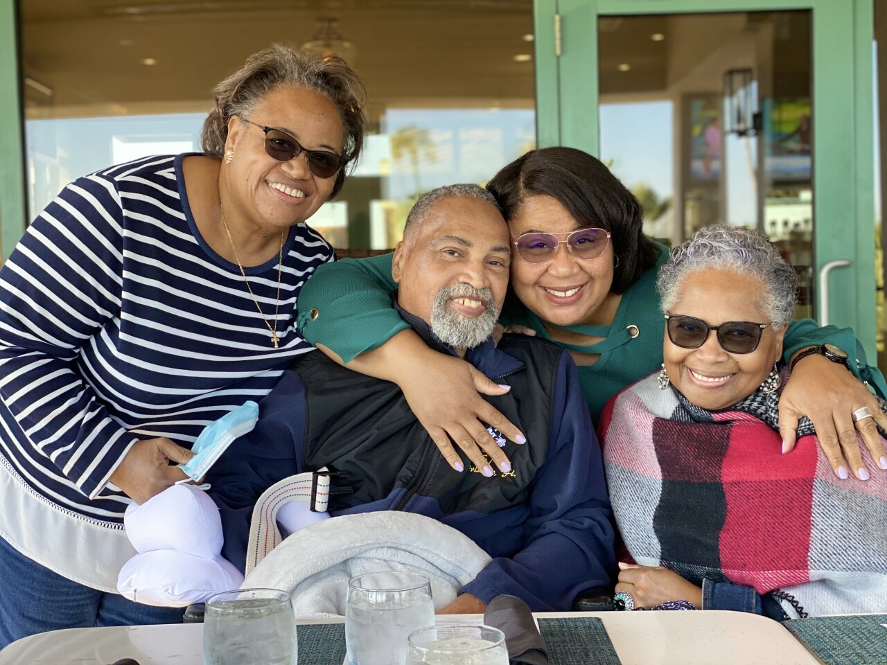 Wayne Beckford and his sisters at lunch