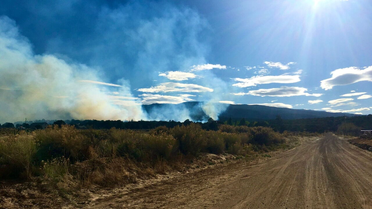 Smoke from the Carcass Creek Fire in Wayne County, Utah is seen Friday, May 6, 2022.