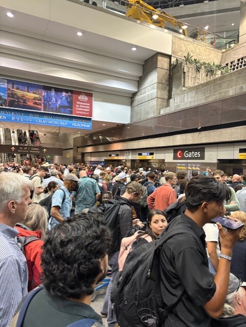 Passengers stacked up escalators on the C concourse