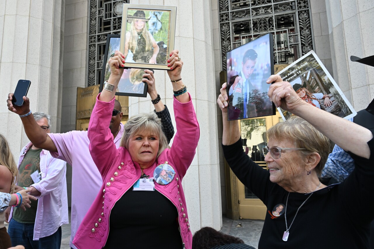 Lori Schott (left) reacts to a Los Angeles jury's decision finding Meta and YouTube responsible for harming young social media users.