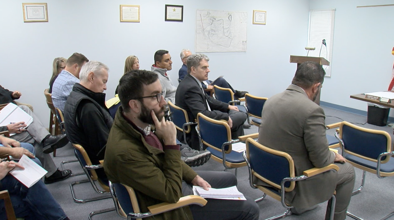 Clermont community and New Richmond School District leaders listen at meeting about Zimmer closure.