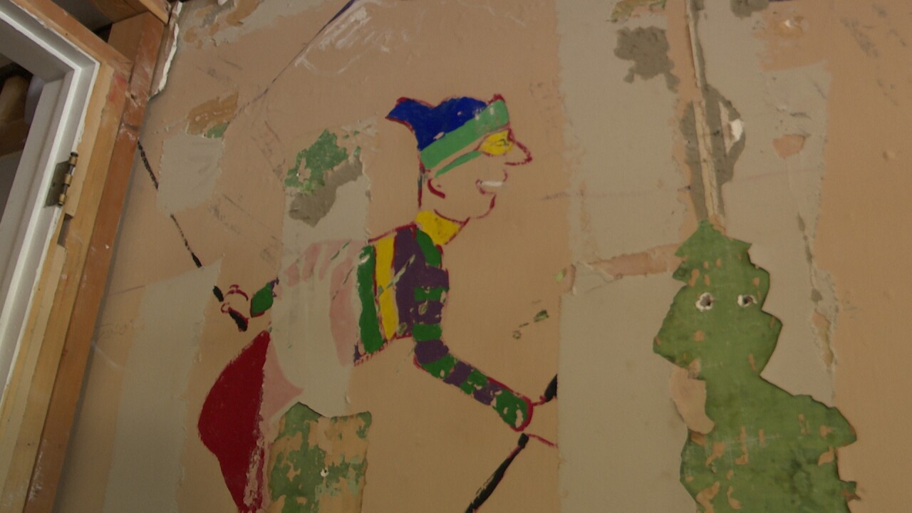 Yodeler Motel mural man