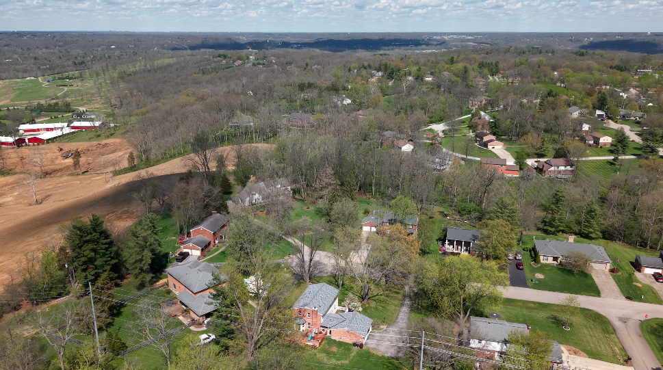 Neighbors accuse Doug Evans of removing thousands of trees from this steep hillside, putting their homes in Pepper Ridge in danger of wind and erosion.