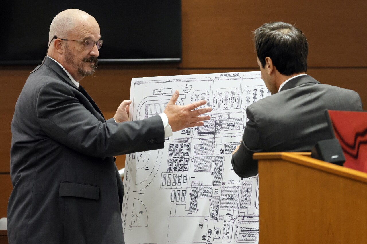 Broward Sheriff's Office Detective John Curcio and defense attorney Mark Eiglarsh look at school map during Scot Peterson trial, June 21, 2023