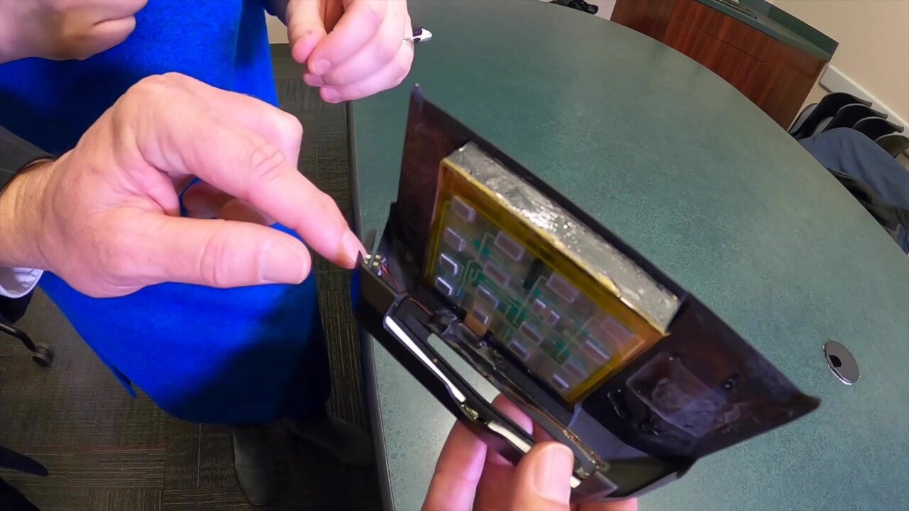 Ohio Investigative Unit agent Bob Boldin explains how skimmers placed over payment terminals at stores capture card numbers and PINs.