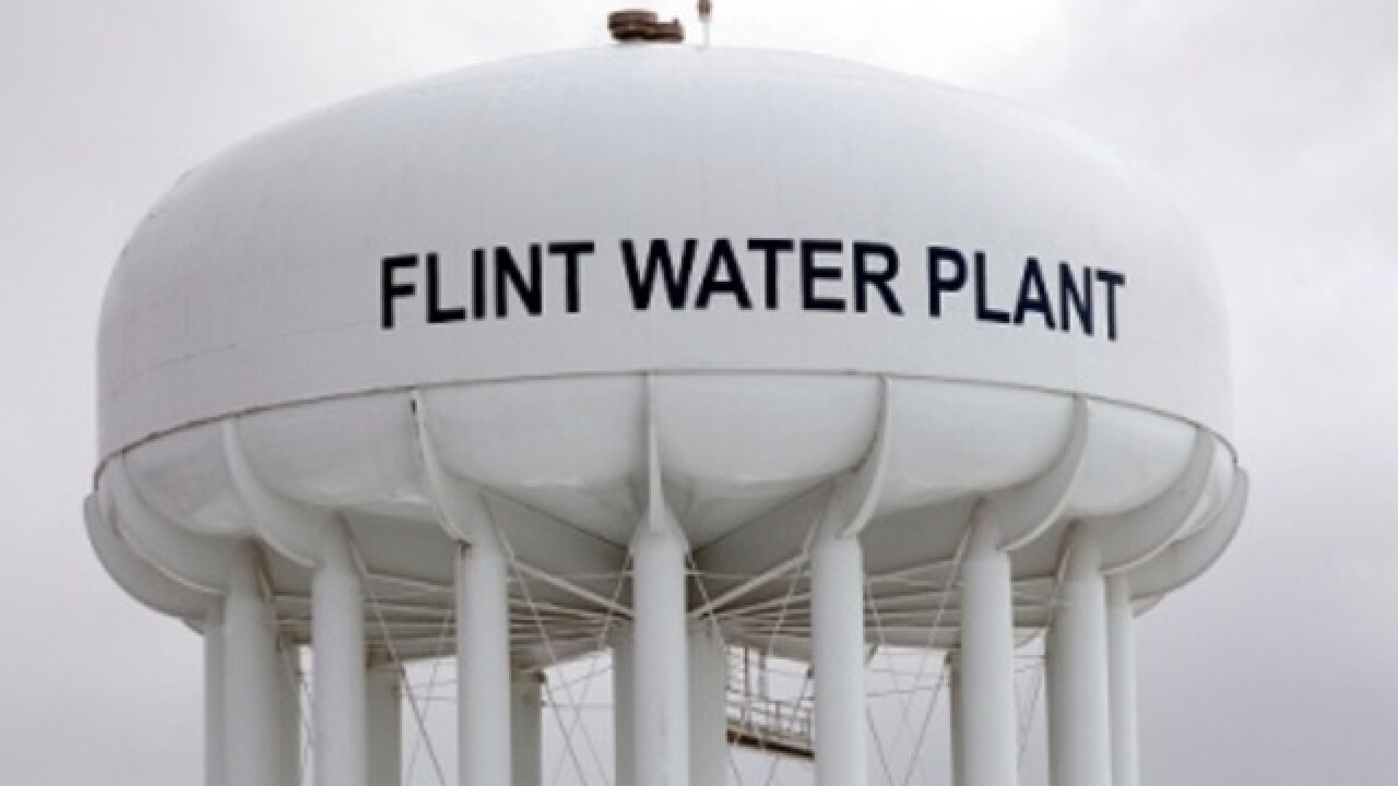 5 people, including Michigan health chief, charged in Flint