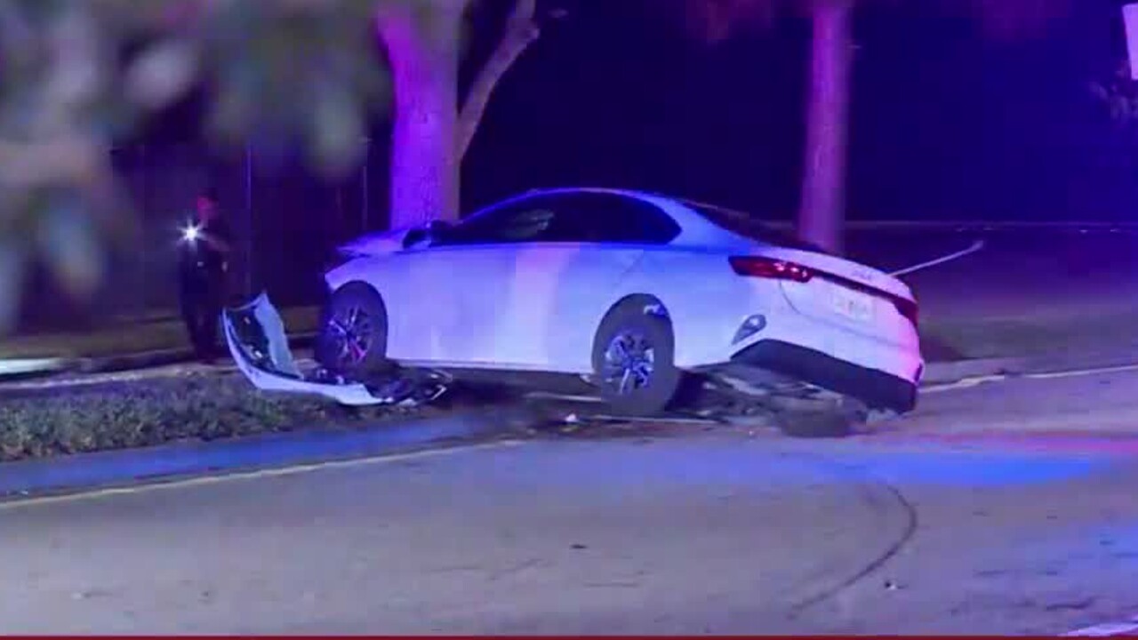A white sedan is involved in a crash at Brandywine Lane and Commerce Center Drive in Port St. Lucie on Feb. 2, 2024.jpg