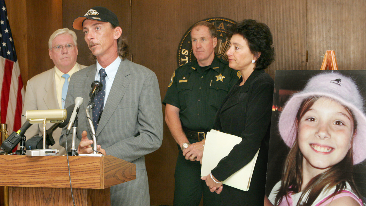 Mark Lunsford and photo of Jessica Lunsford