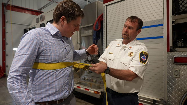 Chief Greg Lang shows WCPO 9 News reporter Sam Harasimowicz how crews saved the horse