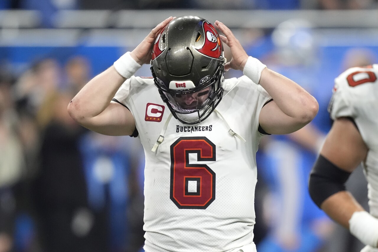 Tampa Bay Buccaneers QB Baker Mayfield walks to sideline after being intercepted in fourth quarter of NFC divisional playoff game at Detroit Lions, Jan. 21, 2024