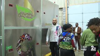 Christopher Dipnarine Executive Director 4MyCiTy Inc. in front of composter