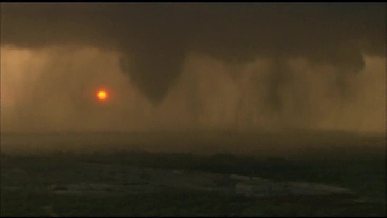 PHOTOS: Tornado forms, touches down