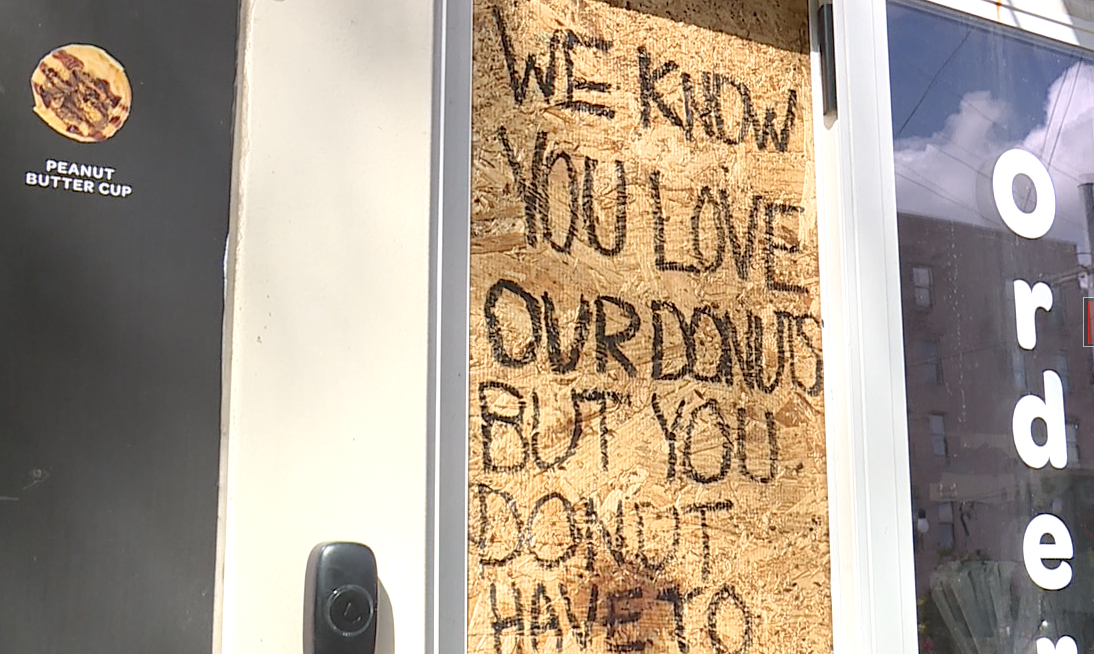 Busted window at Donutology