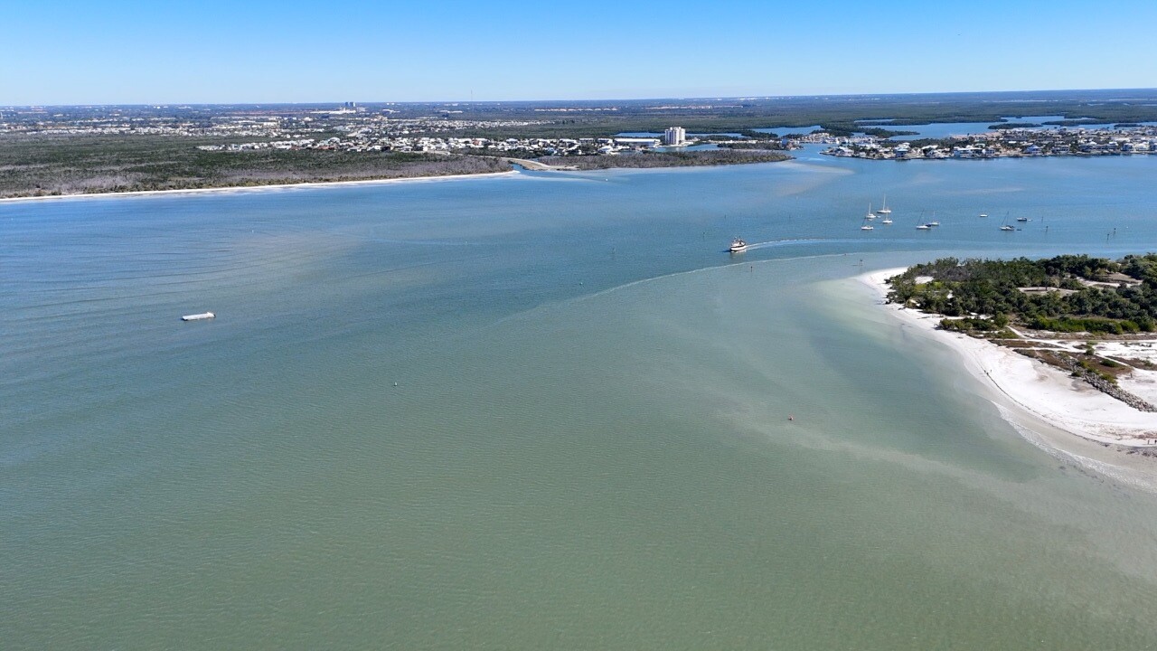 Barge on left, Bowditch Point on right