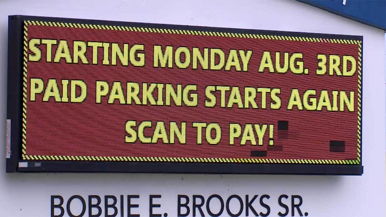 A sign at the Bobbie E. Brooks Sr. Governmental Center in Riviera Beach let residents and visitors to be aware that paid parking was set to resume on Aug. 3, 2026.